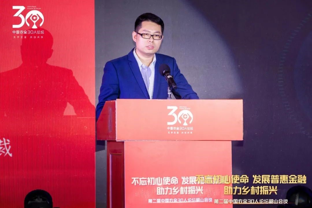 (新希望金融科技公司执行总裁周旭强)